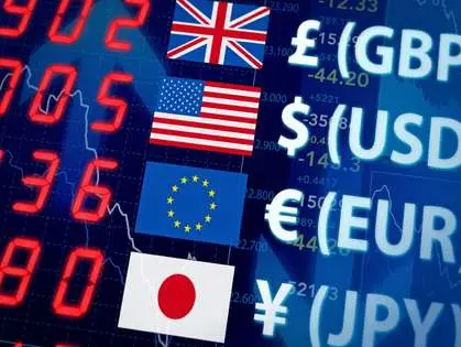 Digital screen with foreign exchange rates and major currency symbols such as GBP, USD, EUR and JPY